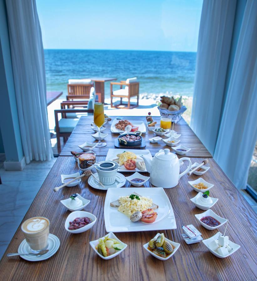 Caravana Beach Resort Al Zorah Adschman Exterior foto